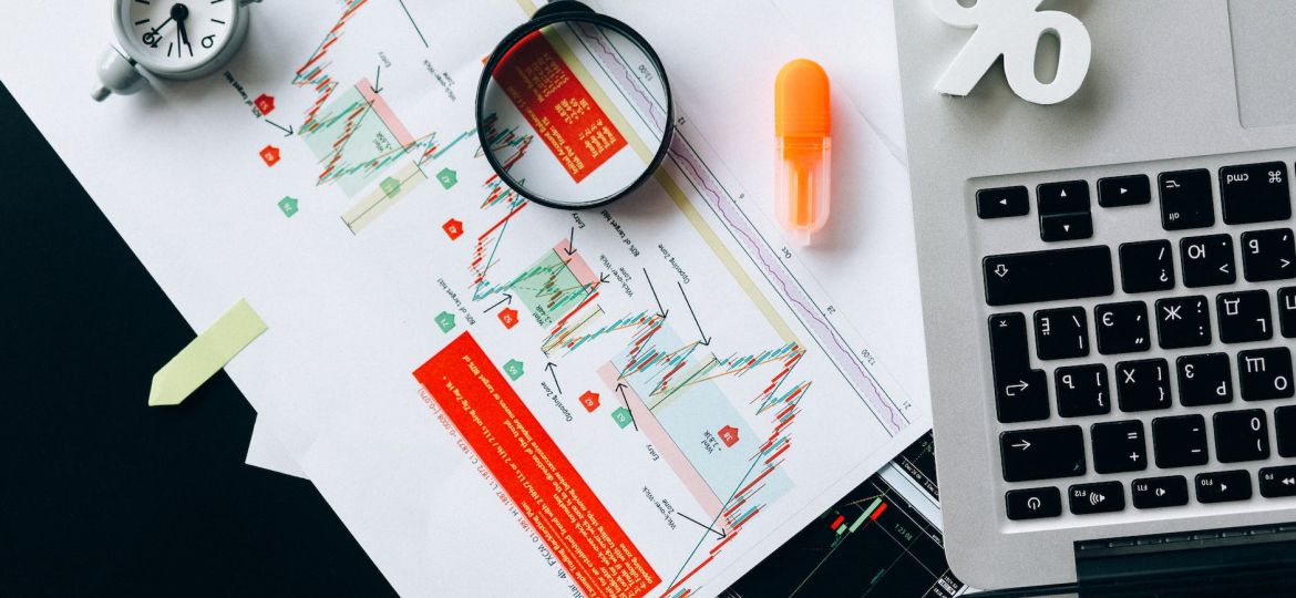 magnifying glass on white paper