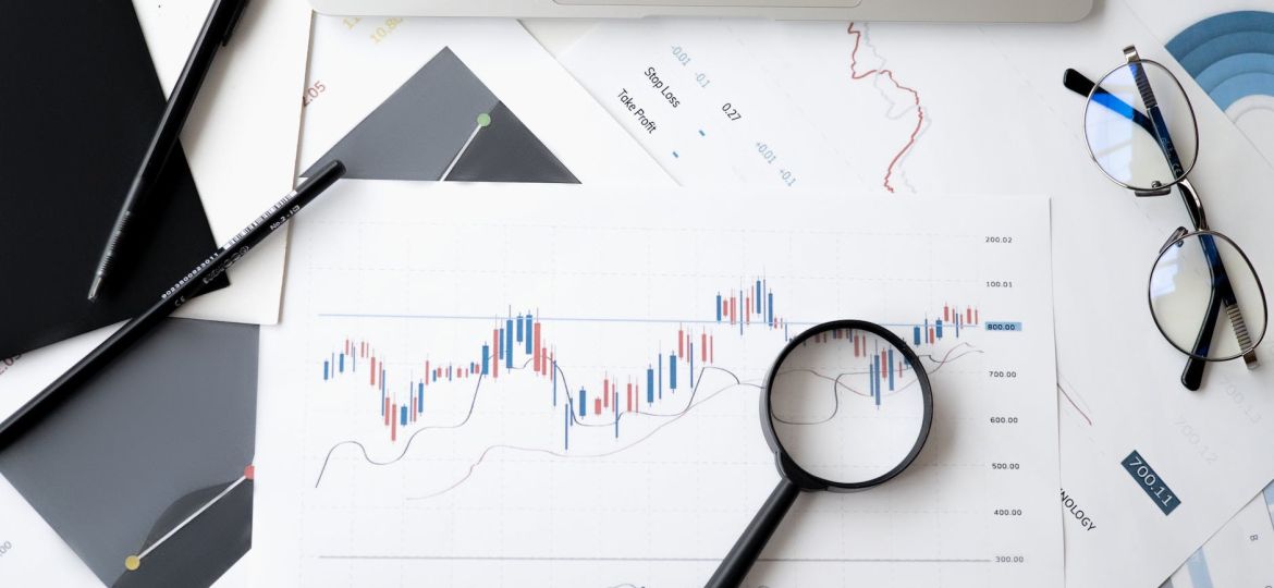 magnifying glass on top of document