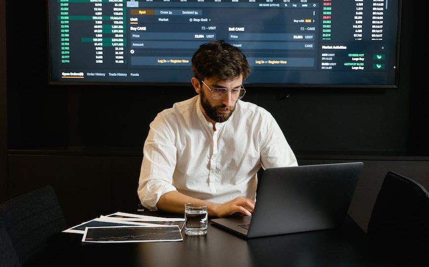 focused professional man using laptop